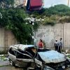 Auto cae de puente tras choque con camión papayero; hay 4 heridos